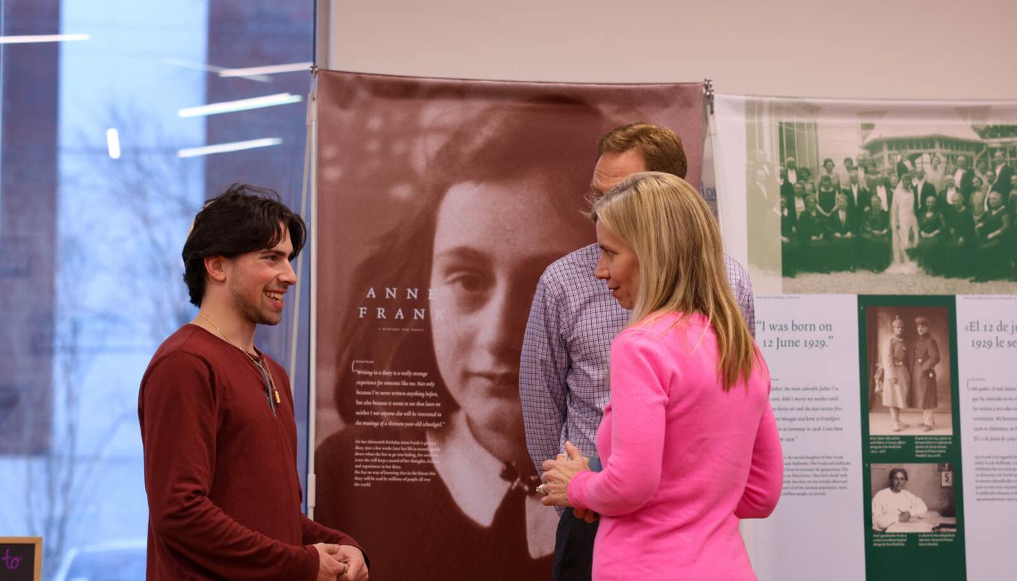 Event attendees have a conversation during the grand opening of the UGA Jewish studies “A History for Today” Anne Frank exhibition.