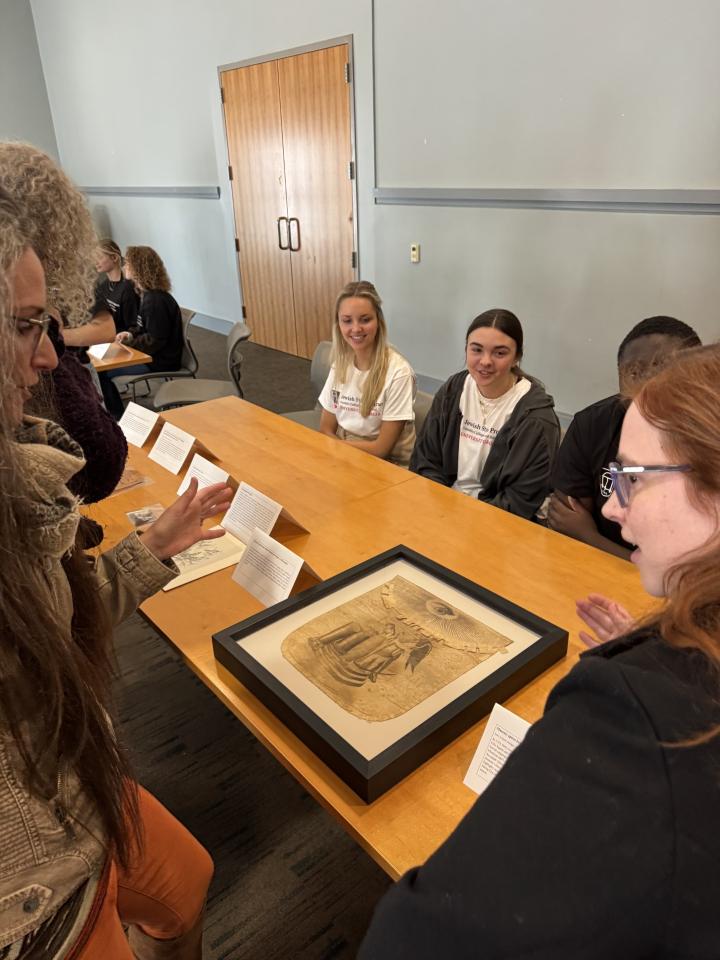 Students showcasing their exhibit contributions.